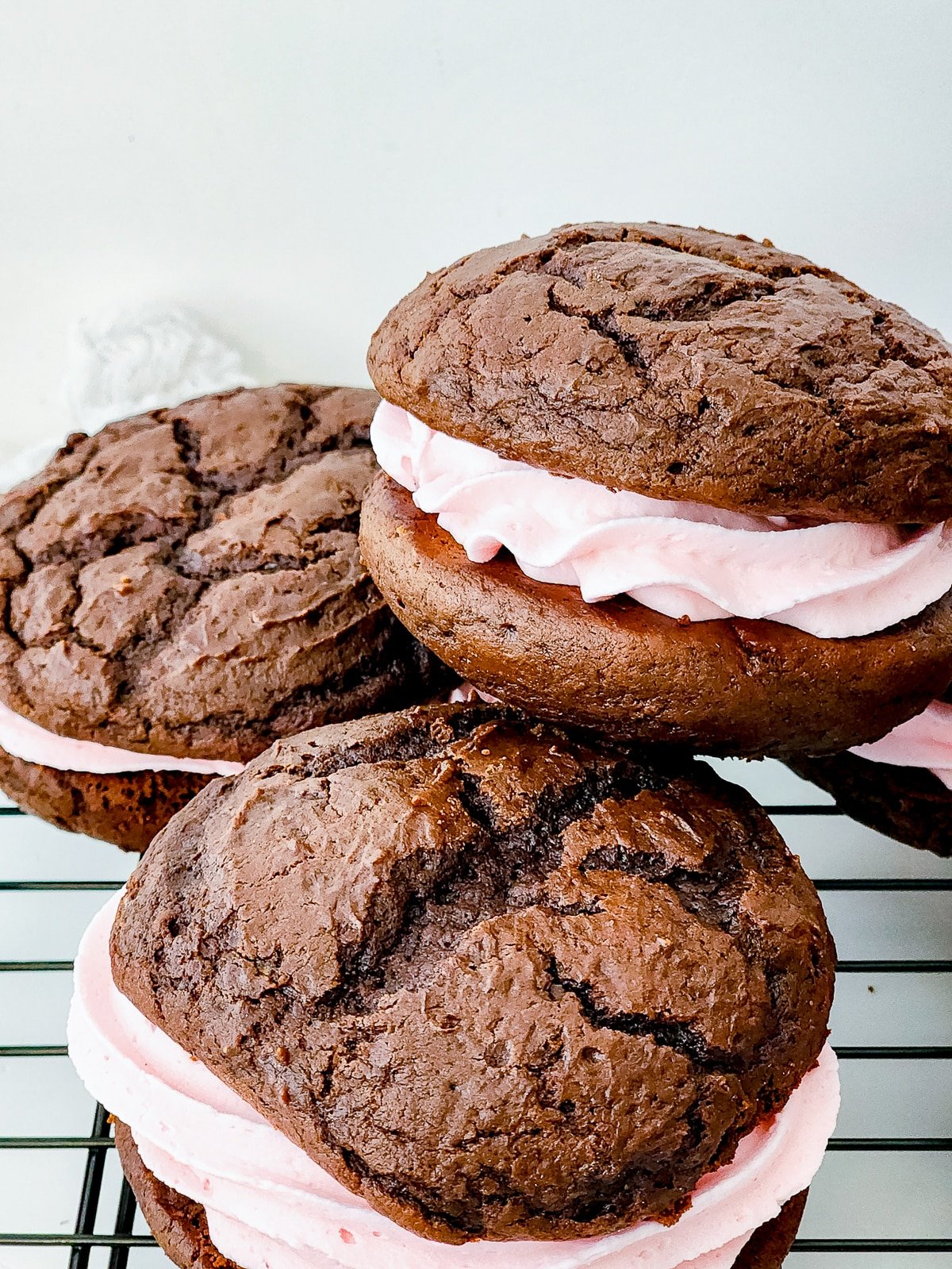 Whoopie Pies Recipe stacked on a wire rack