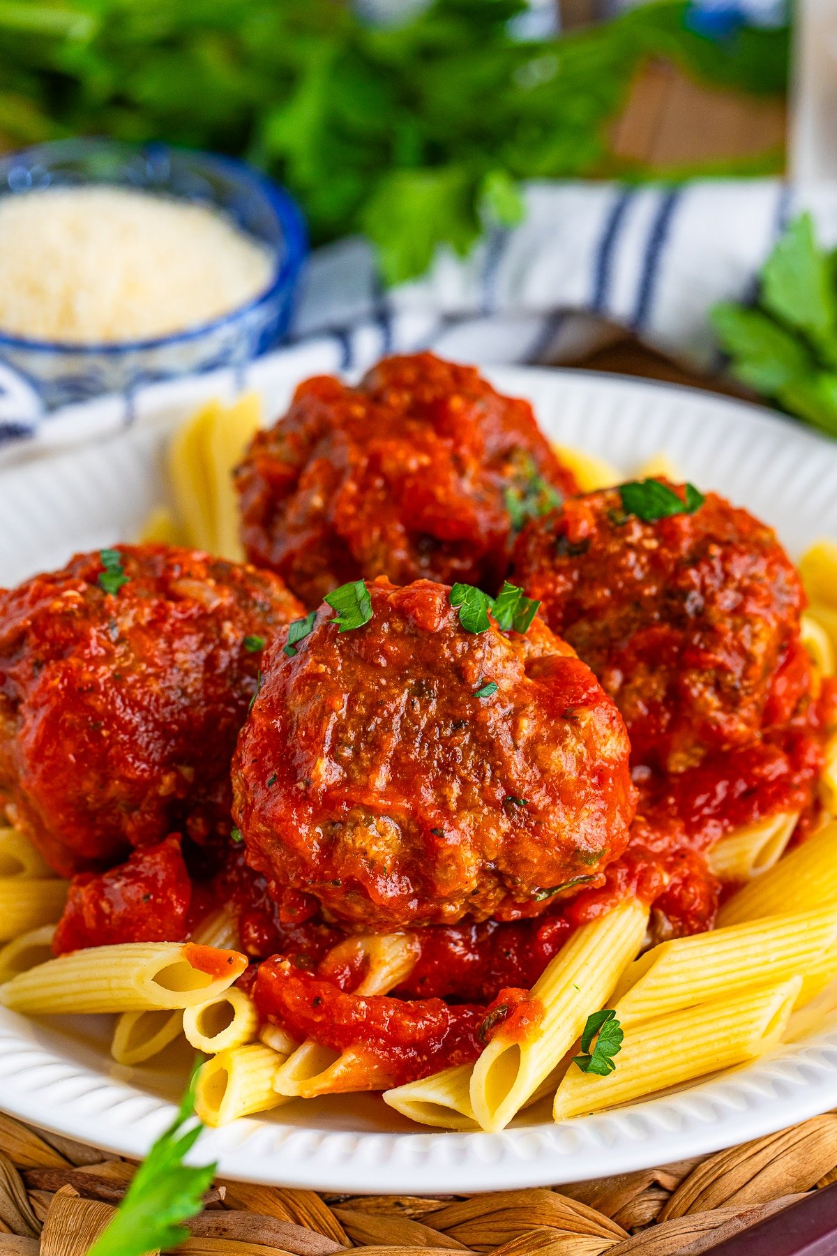 Italian Meatball Recipe on pasta on a serving plate
