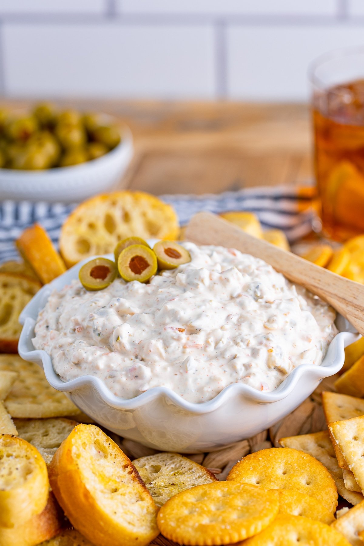 olive dip in a white bowl