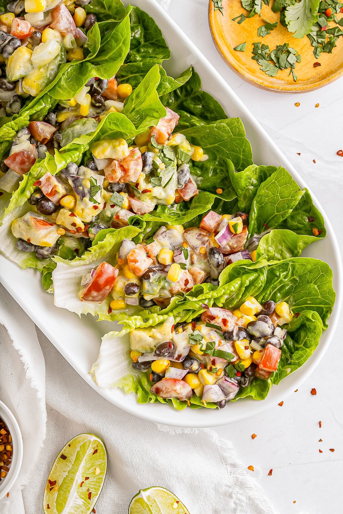 overhead image Lettuce Wraps on a oval white plate