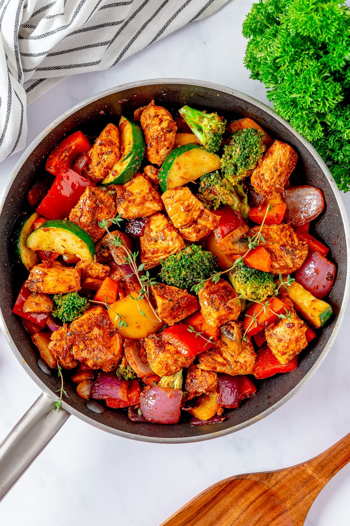 overhead image of finished Chicken and Vegetables in a skillet
