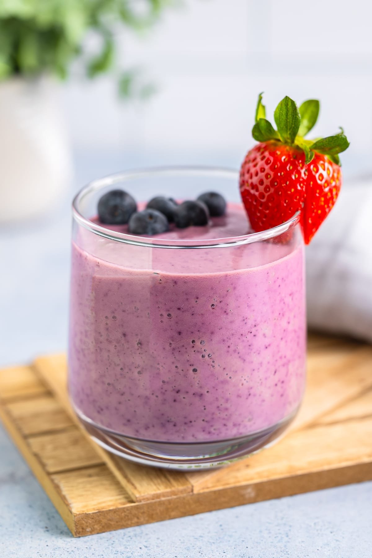 Yogurt Fruit Smoothie in a glass with garnishes