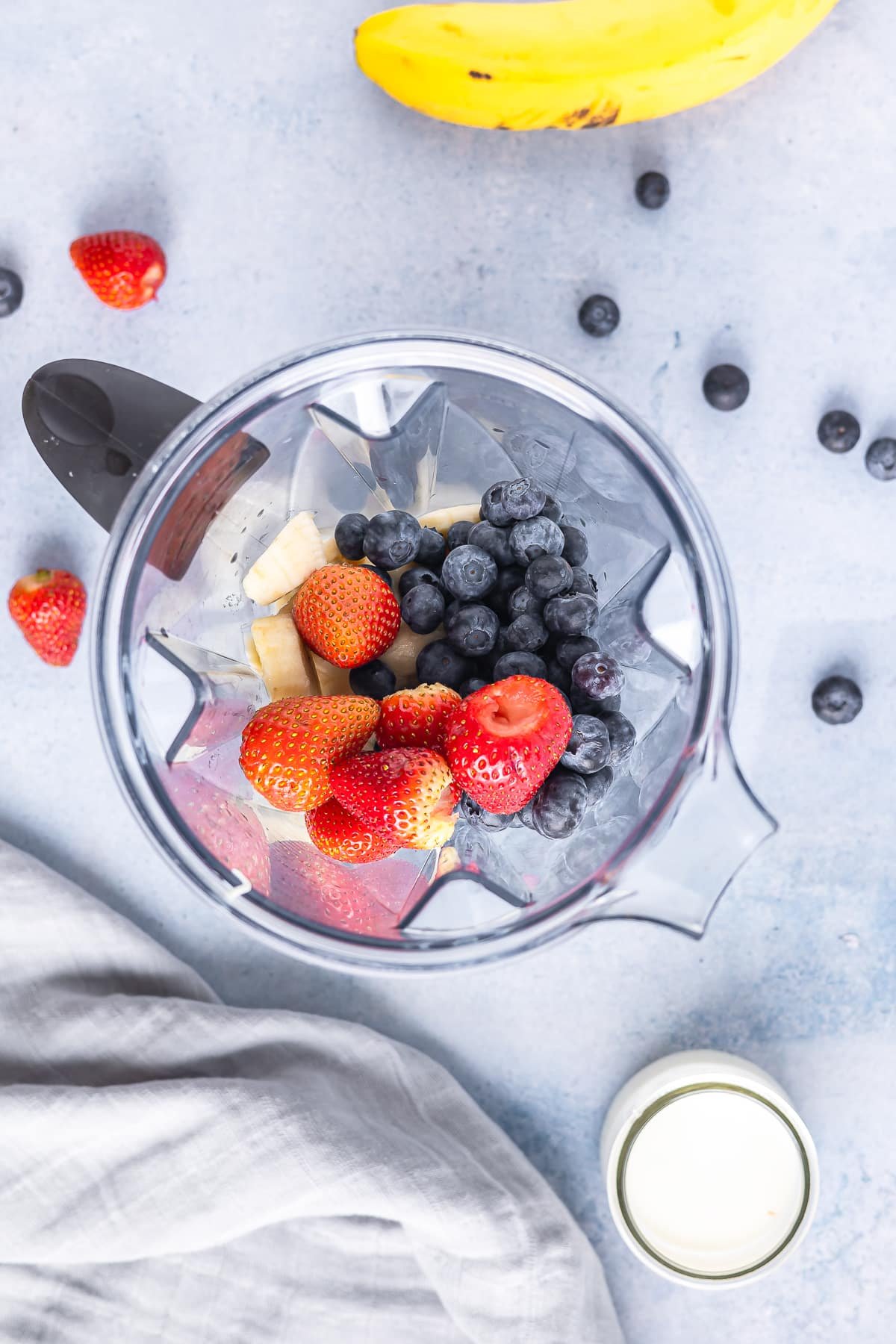 ingredients in a blender for Yogurt Fruit Smoothie