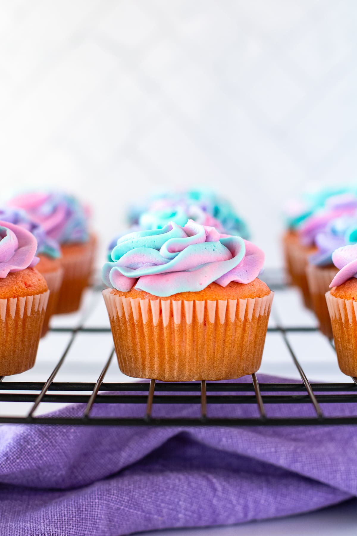 Cherry Cupcakes on a wire rack
