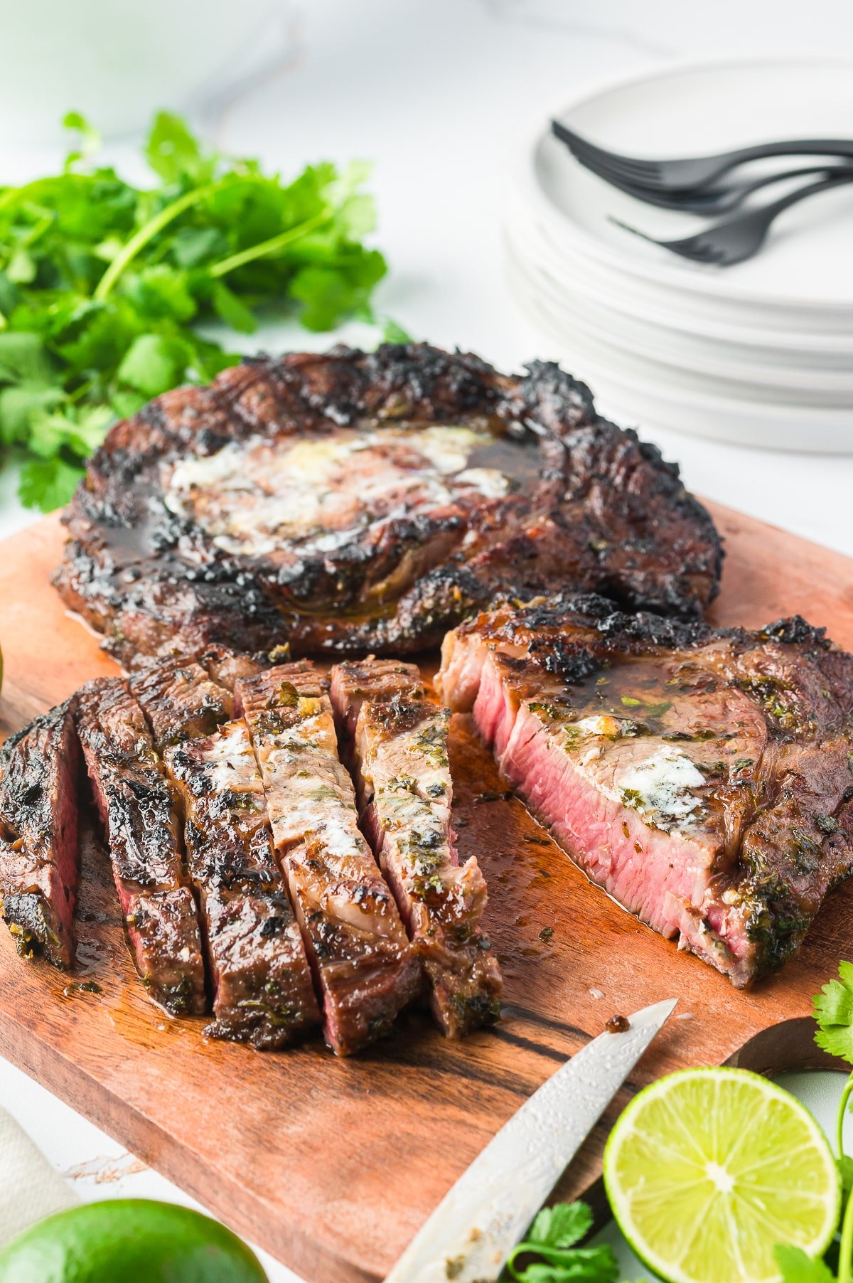 Ribeye Steaks Recipe cut into strips on serving platter