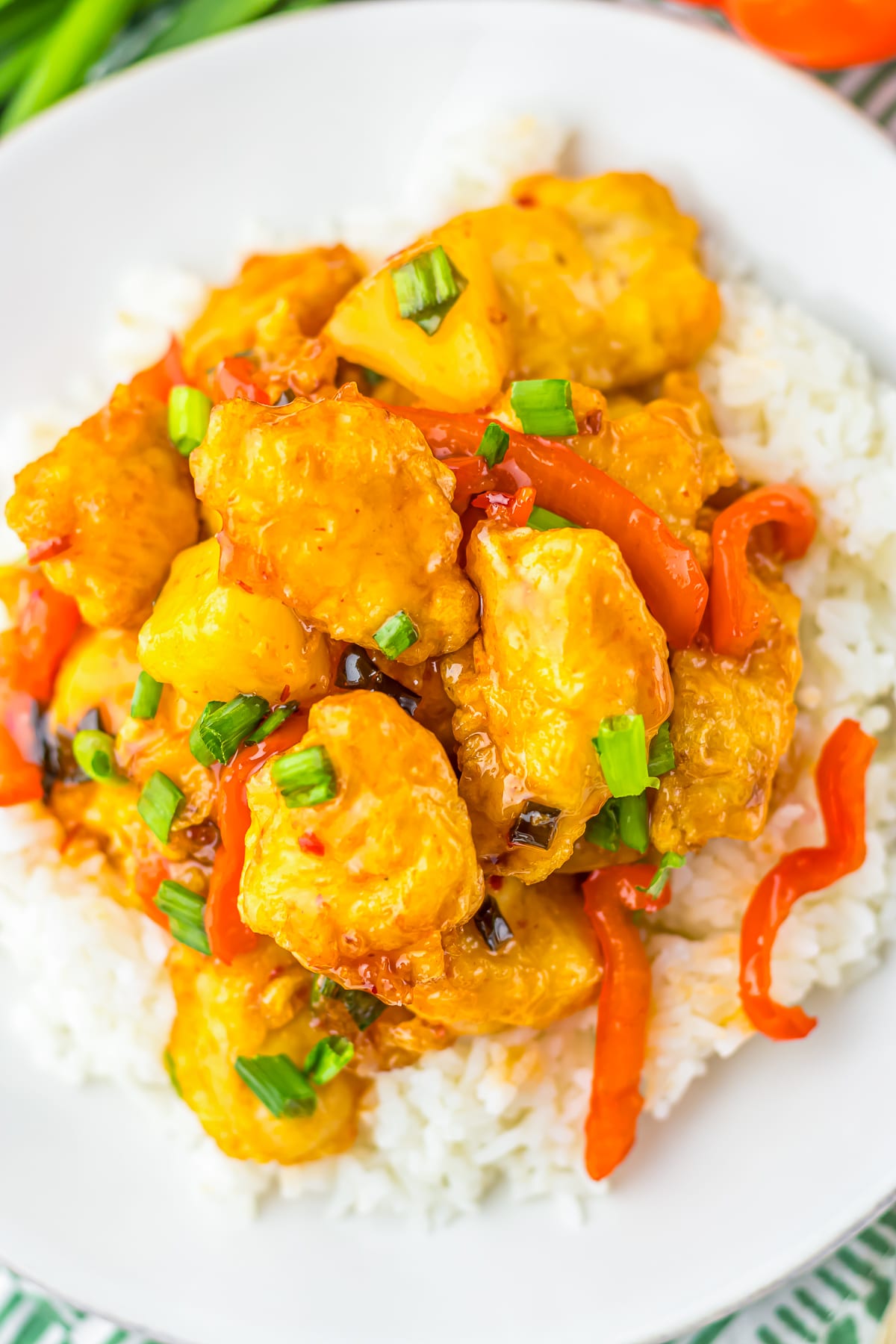 overhead image Sweet Chili Sauce Chicken served on a plate over rice