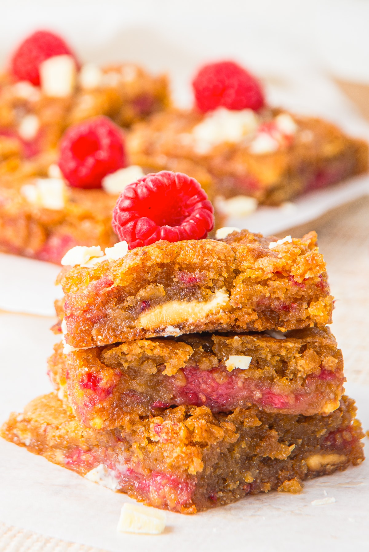 3 Raspberry White Chocolate Brownies stacked on top of each other