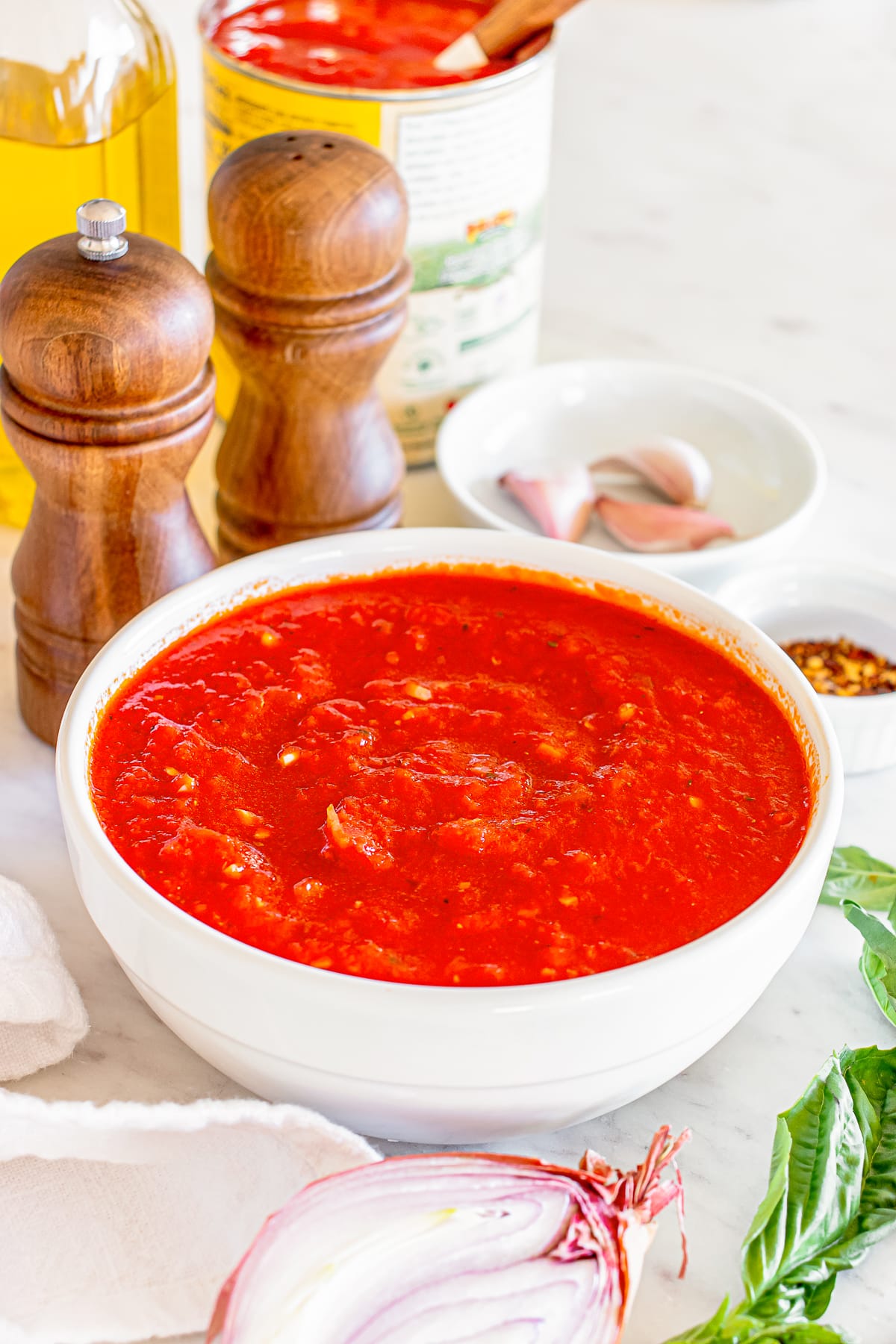finished homemade marinara sauce in a white bowl