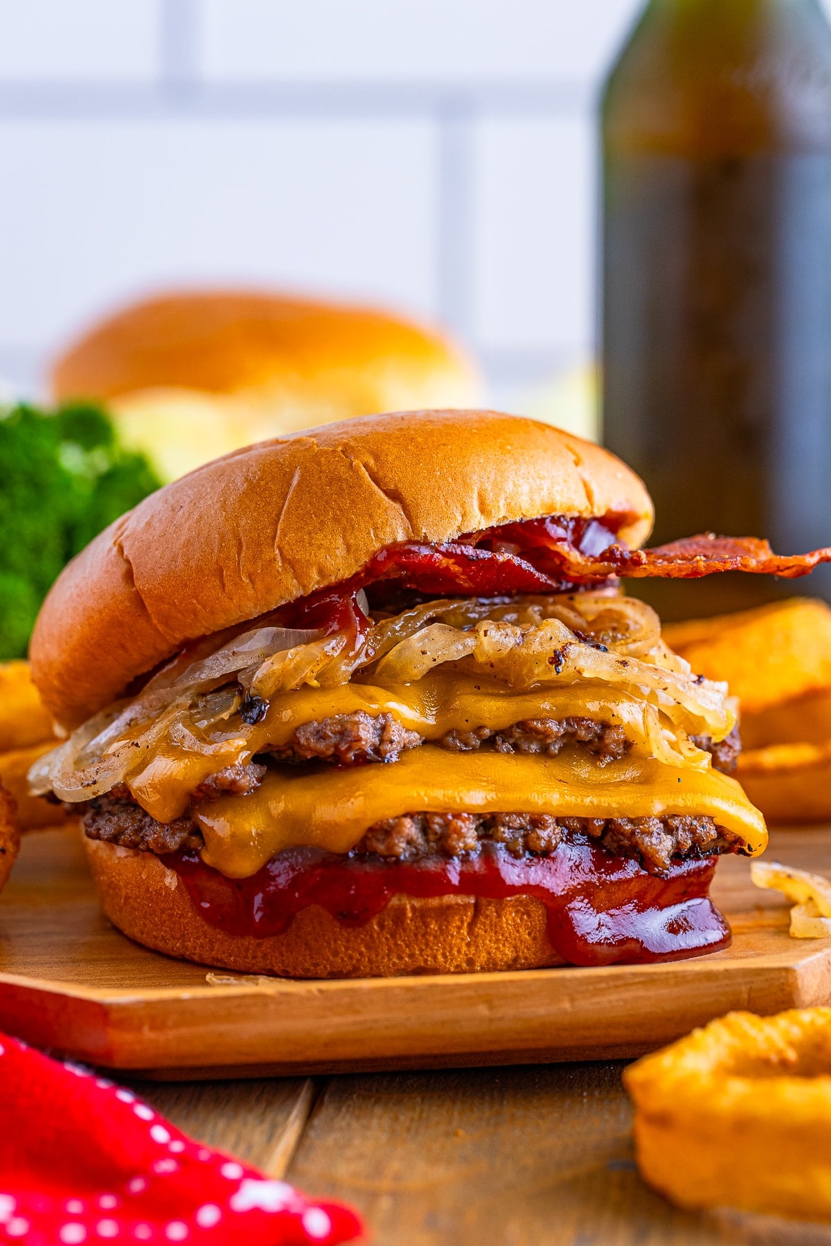 Blackstone Smash Burgers on a wooden plate