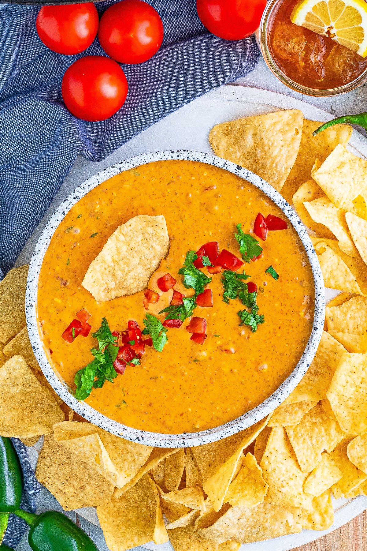 over head image Crock Pot Queso Dip in serving bowl with chips