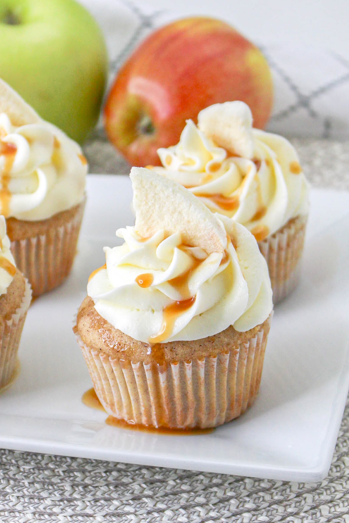 Apple Pie Cupcakes served in a white plate with caramel sauce