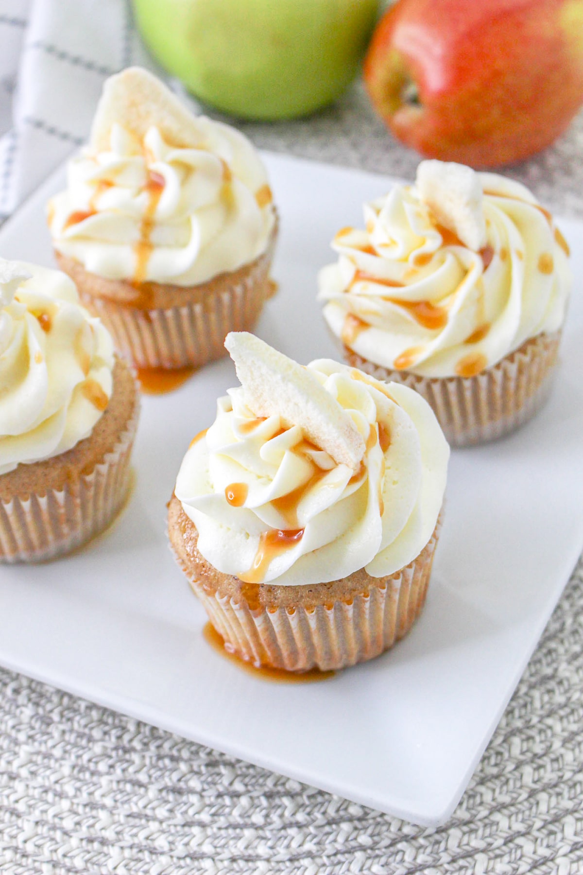 overhead image of Apple Pie Cupcakes on a square white serving plate