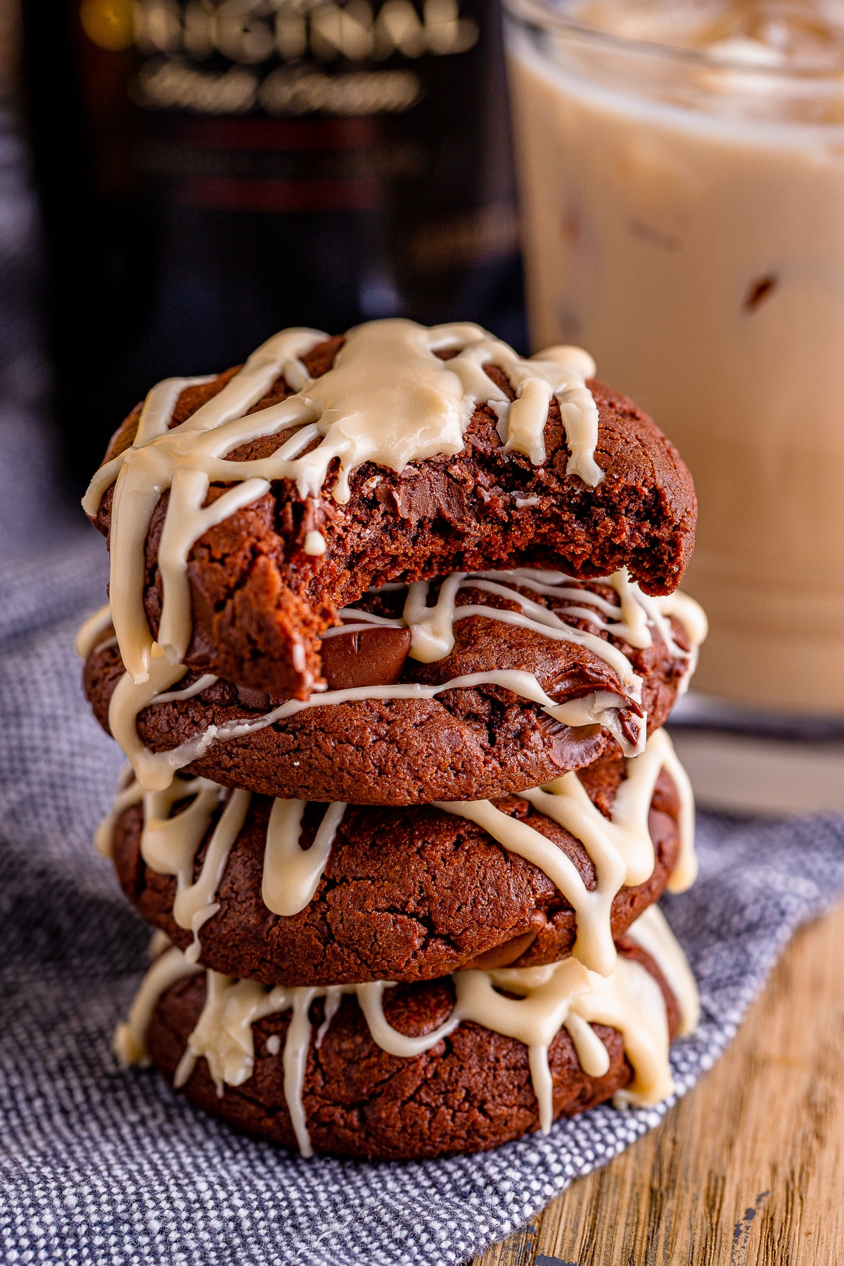 four Chocolate Cookies stacked on top of each other with a bite taken out