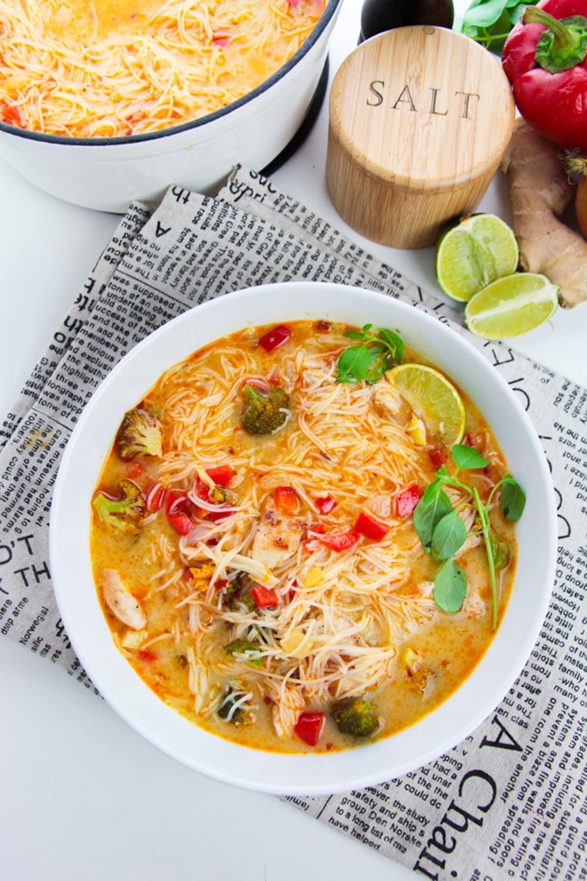 overhead image Thai Red Curry Soup in a white serving bowl