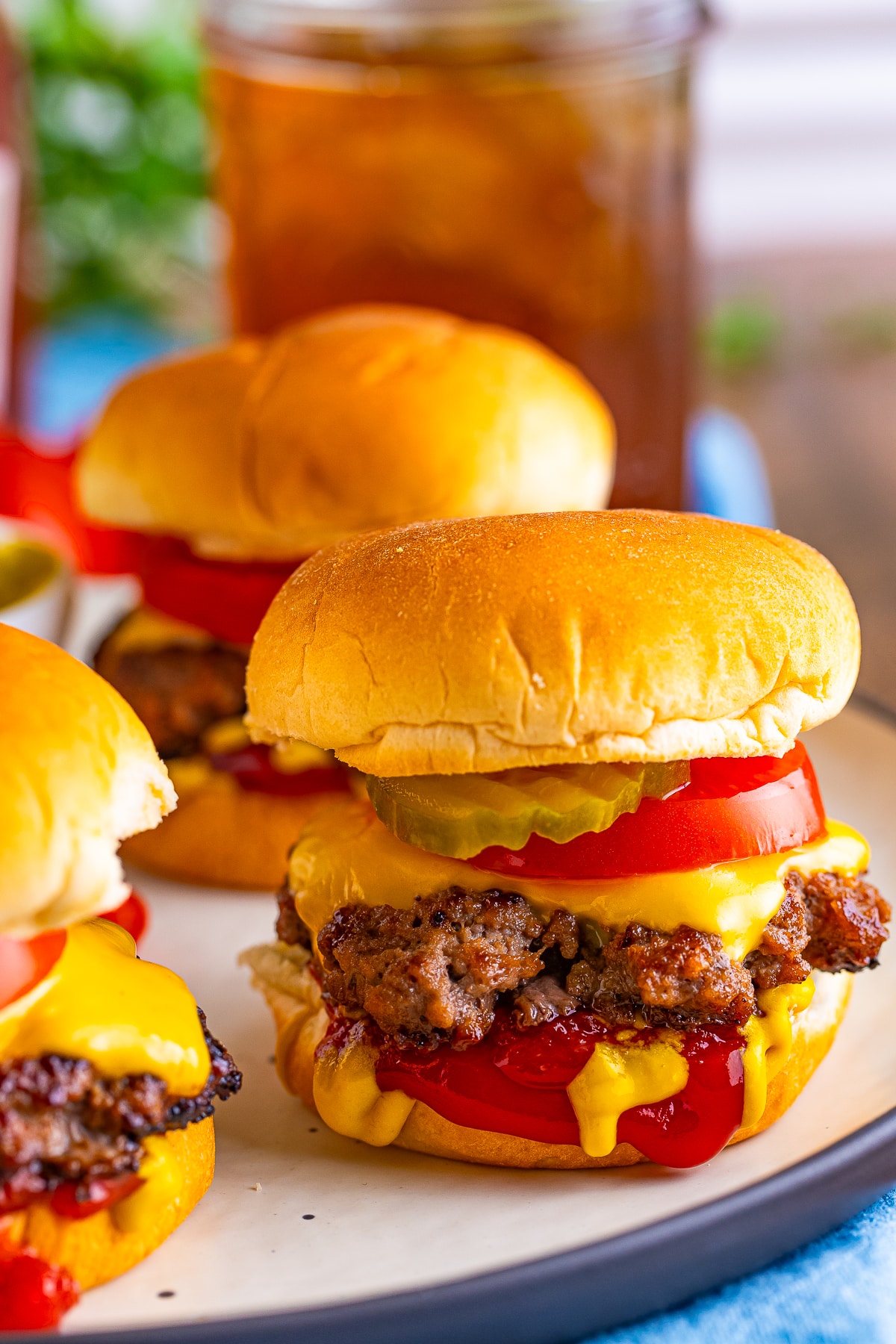 Mini Burger Sliders served on tan plate