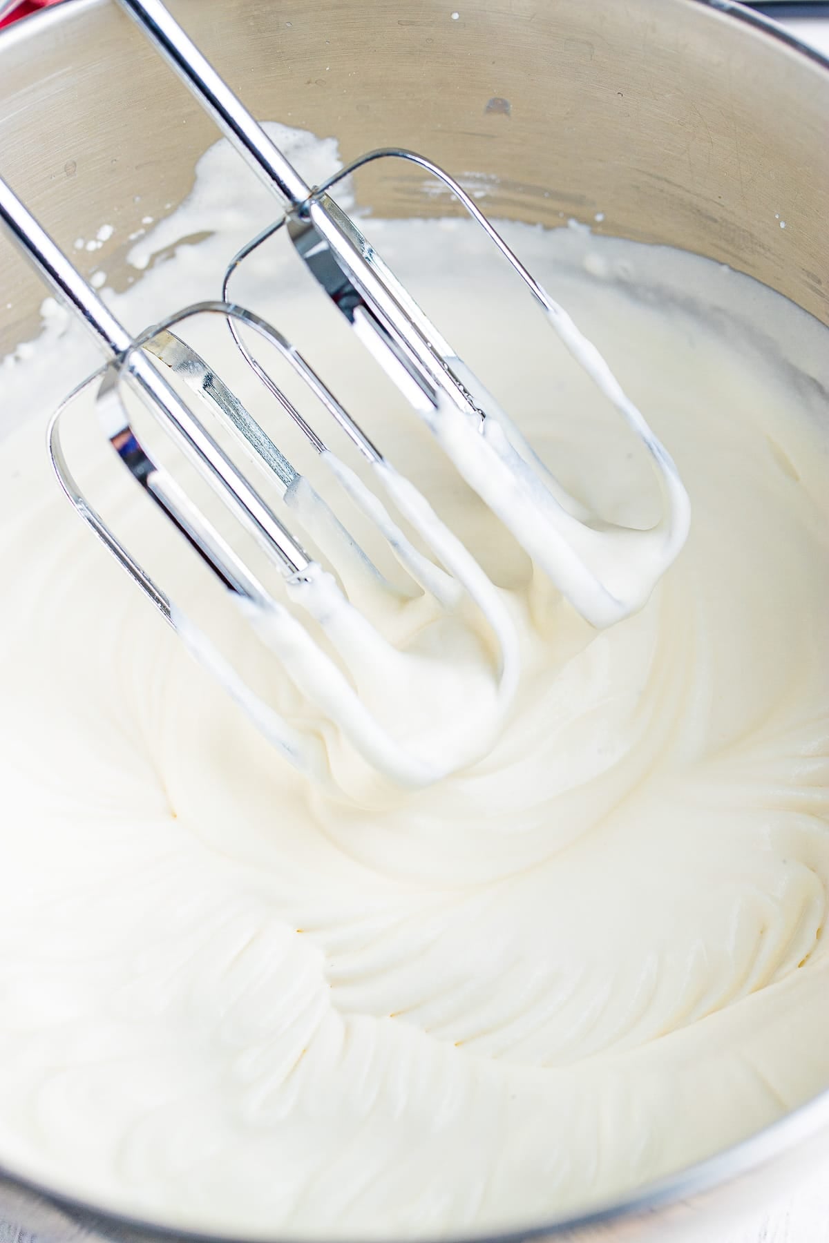 Maple Whipped Cream in the bowl with beaters