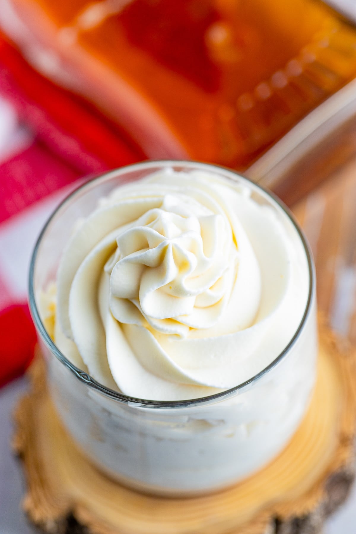 overhead image of piped Maple Whipped Cream in a glass