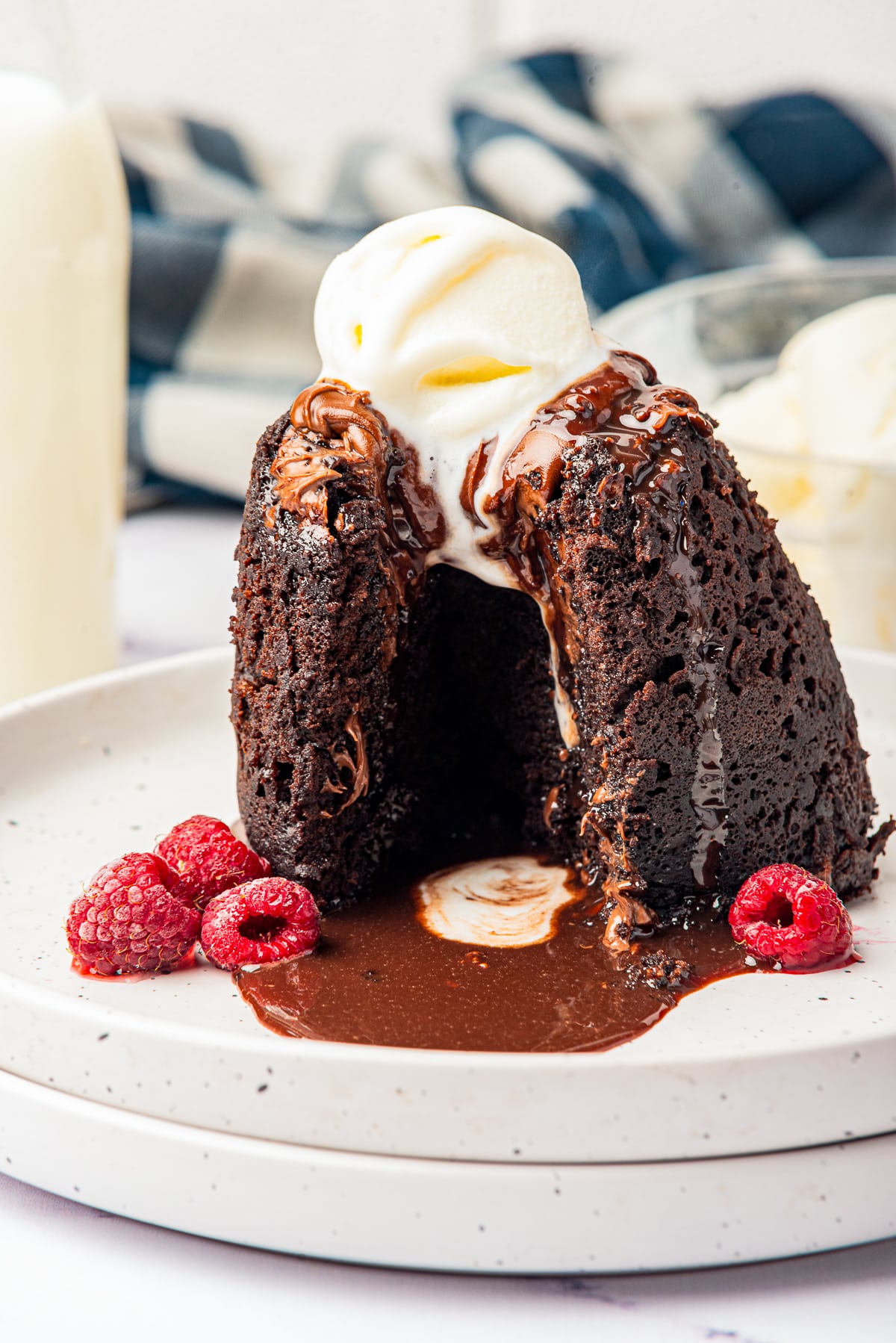 Microwave Lava Cake on a plate with the molten center running out