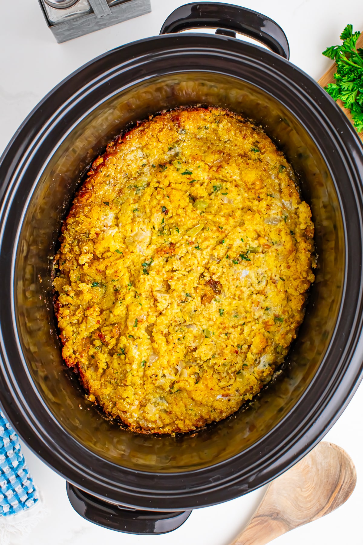 overhead image of finished Cornbread Dressing in the slow cooker