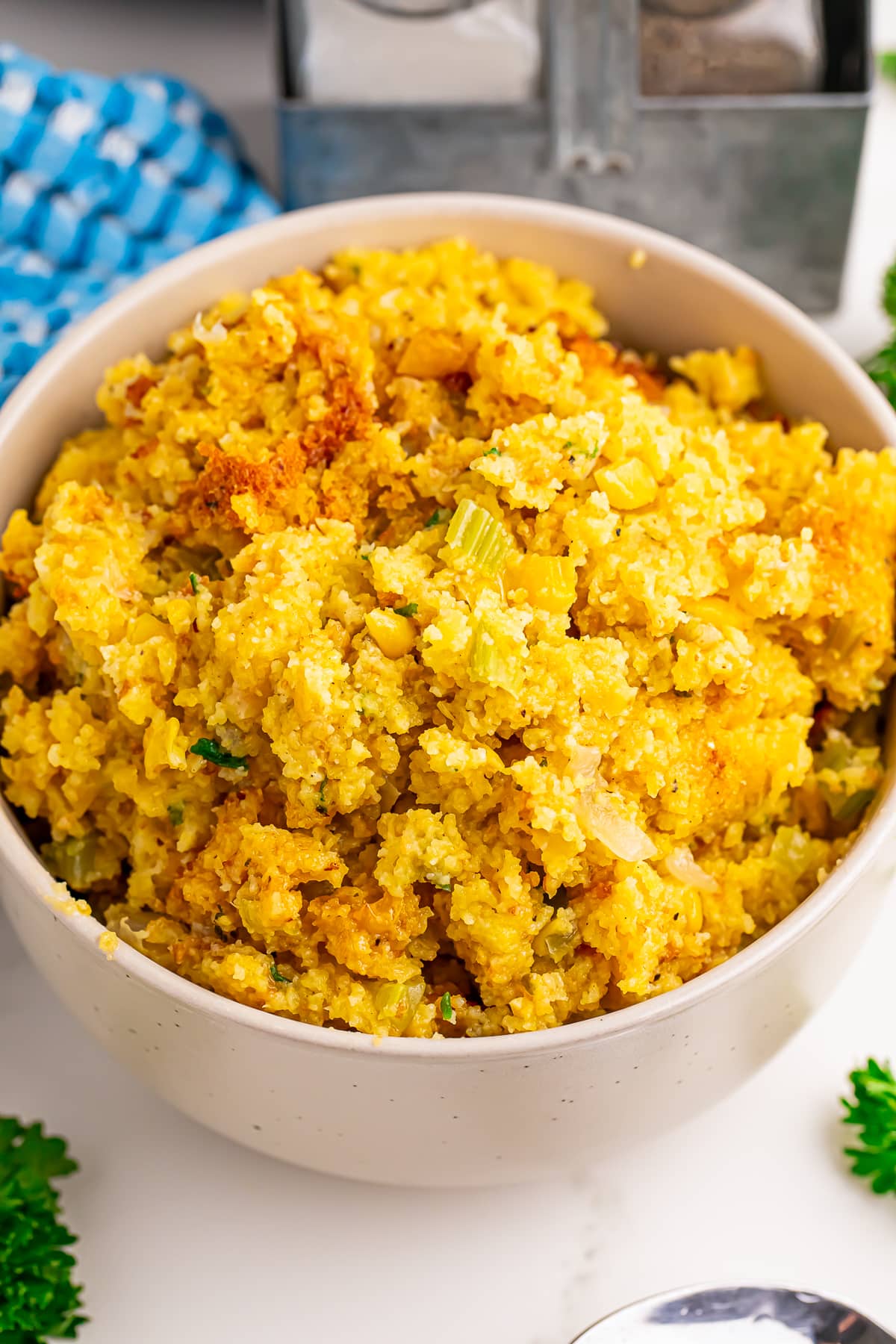 a portion of Cornbread Dressing in a white bowl