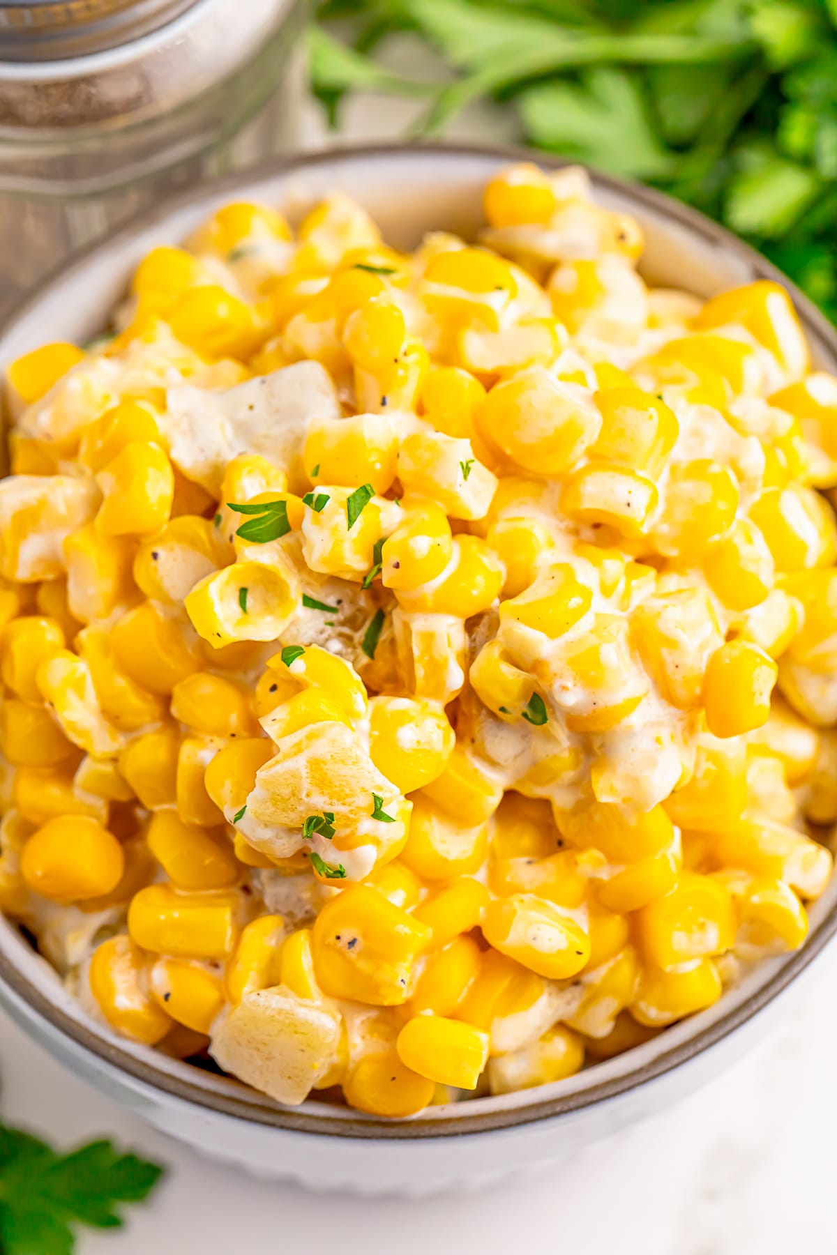 Slow Cooker Creamed Corn portion served in a bowl