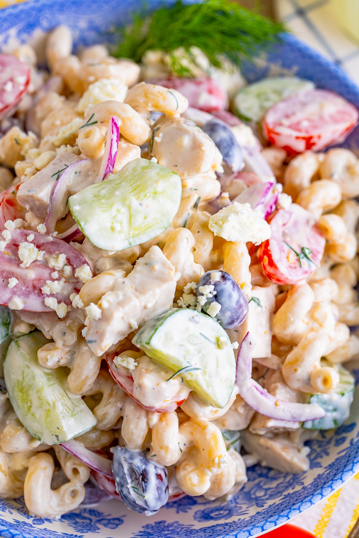 up close overhead image of Greek Pasta Salad Recipe in serving bowl