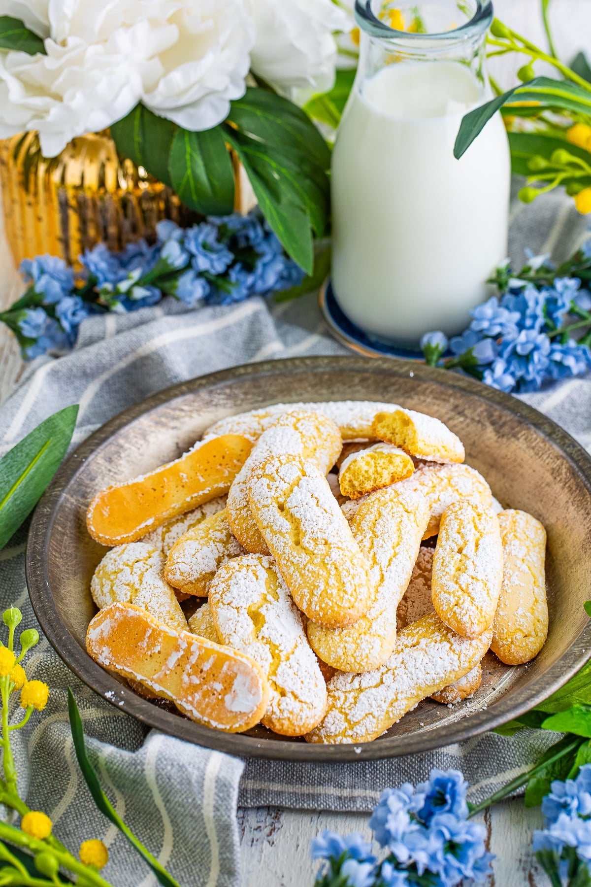 farther away image of Lady Finger cookies served in a metal tray