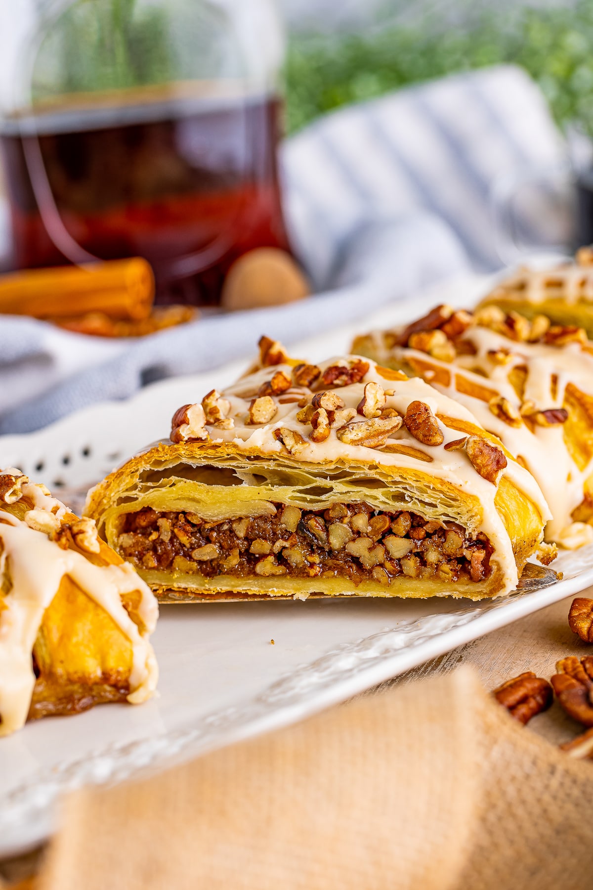 up close image of a slice of Pecan Pastry on serving board