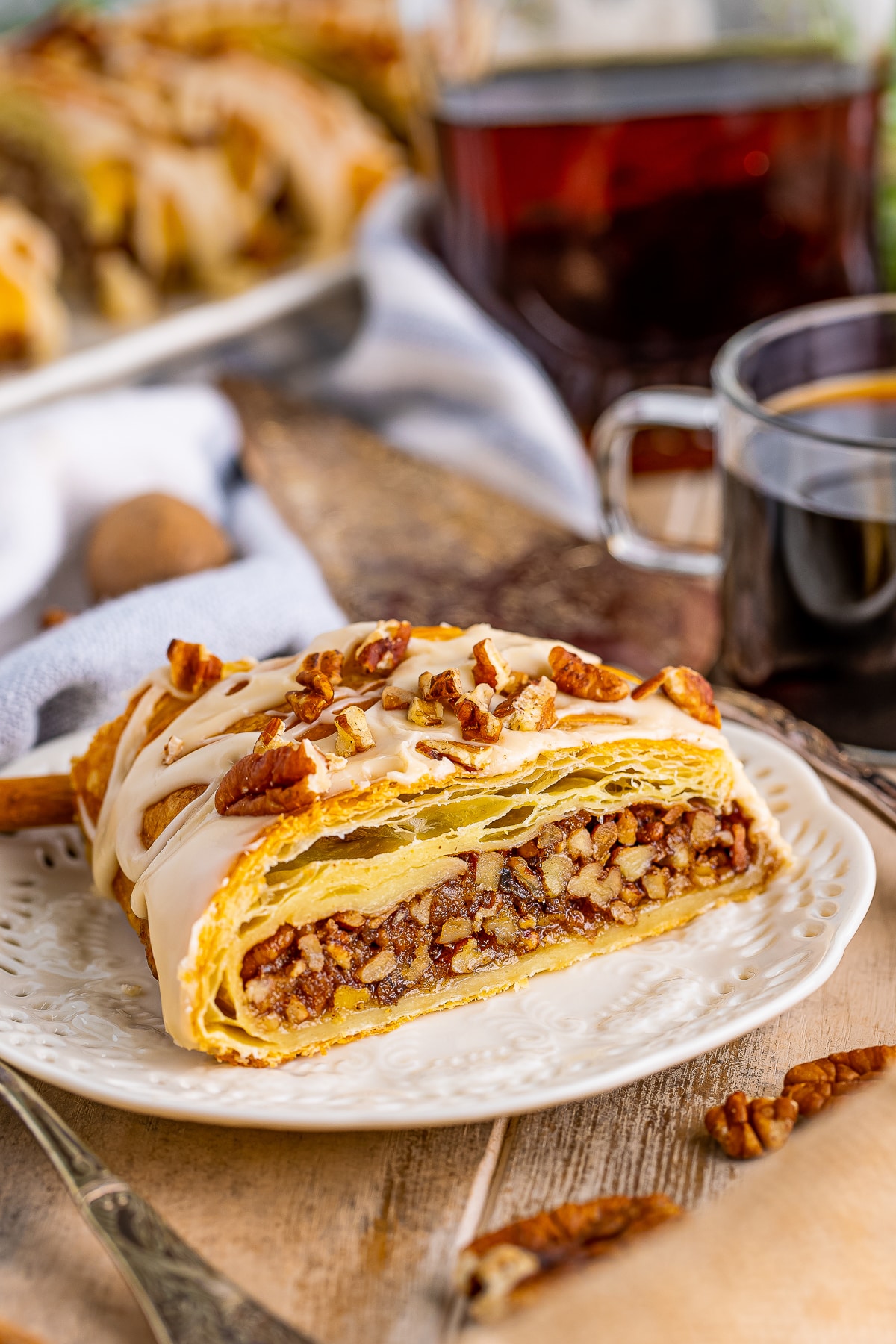 a slice of Pecan Pastry on a tan plate