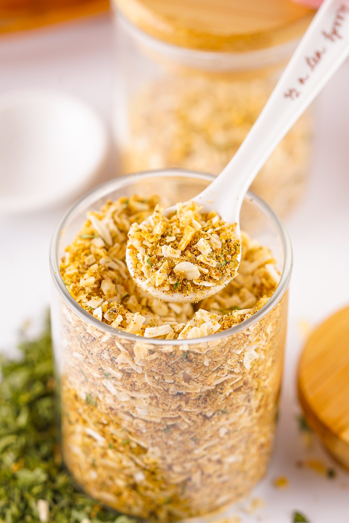 Onion Soup Mix Recipe on a spoon in air over a jar