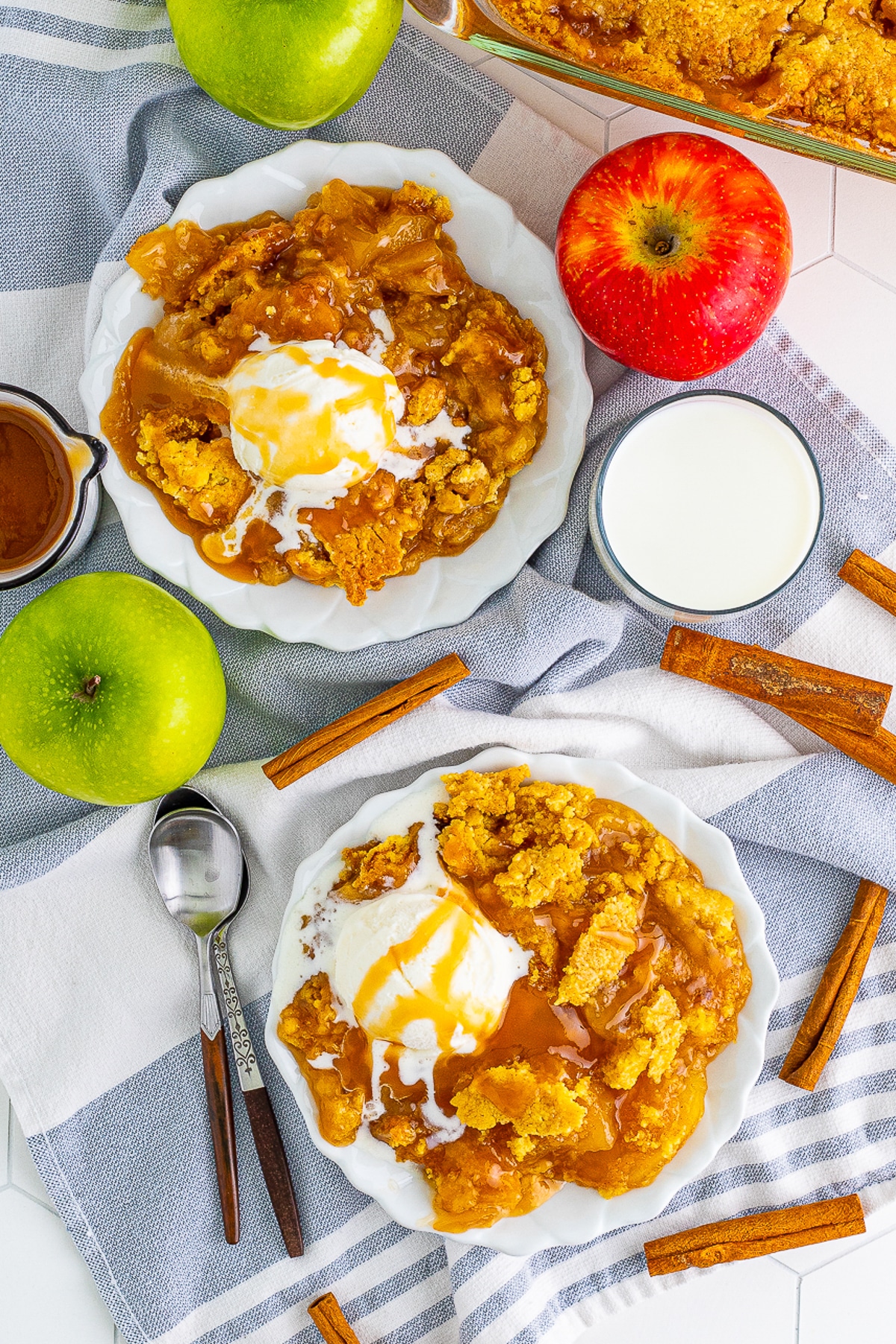 overhead image of Caramel Apple Dump Cake served on two plates