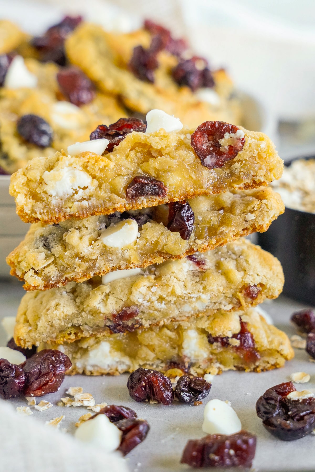 two White Chocolate Cranberry Cookies cut in half and stacked on top of each other