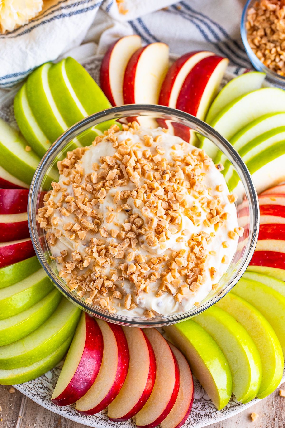 Caramel Apple Dip, a yummy appetizer or after-school snack. #Recipe from ThisSillyGirlsKitchen.com #caramelappledip #fruitdip #dip #appetizer #dessert overhead image of Caramel Apple Dip served with apple slices