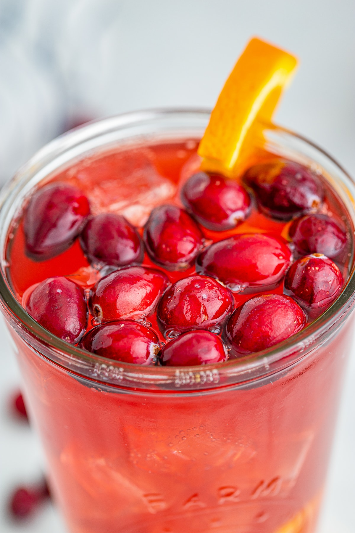 up close image of garnishes in glass of Rum Punch