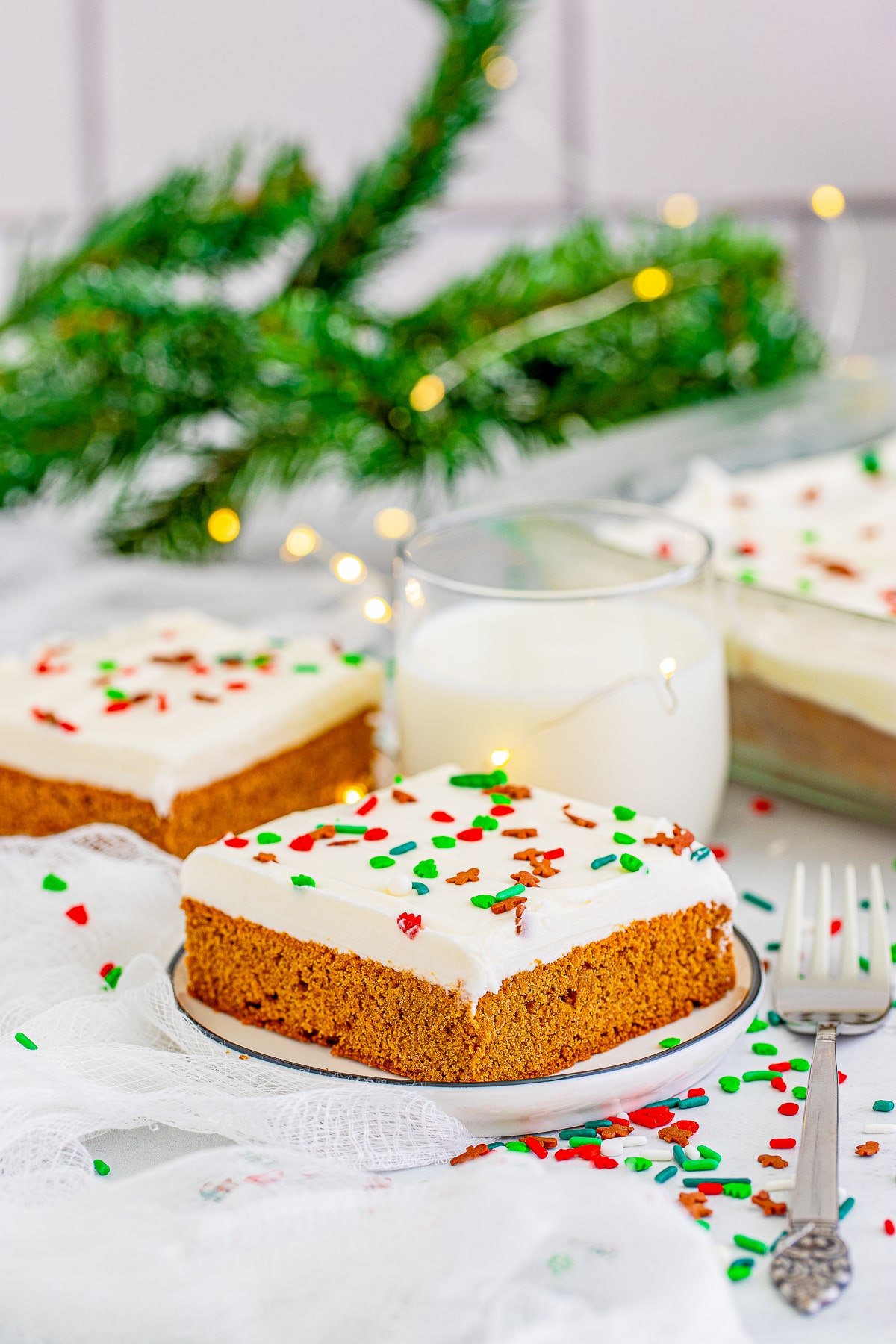 farther away image of Gingerbread Bars on white plates