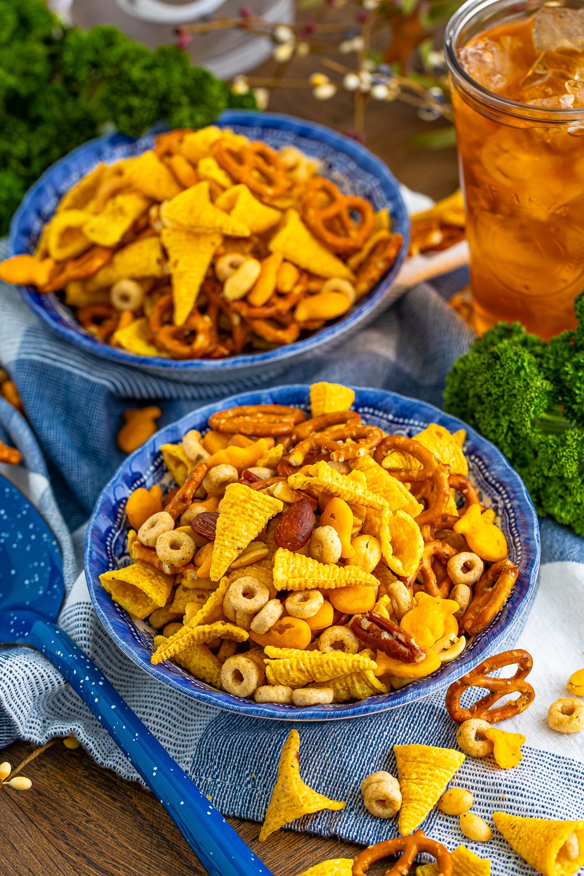 Snack Mix served in bowls on a wooden table top