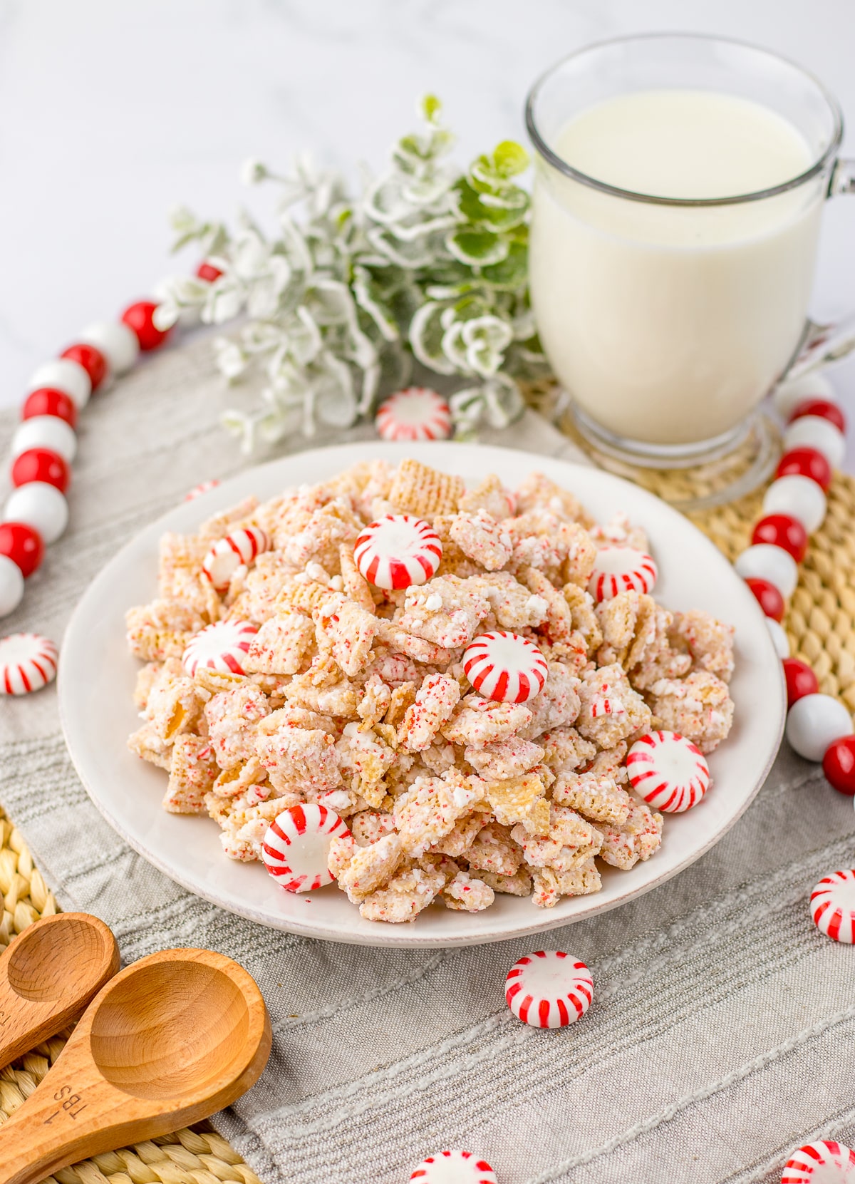 farther away image of White Chocolate Chex Mix Recipe served in a white bowl