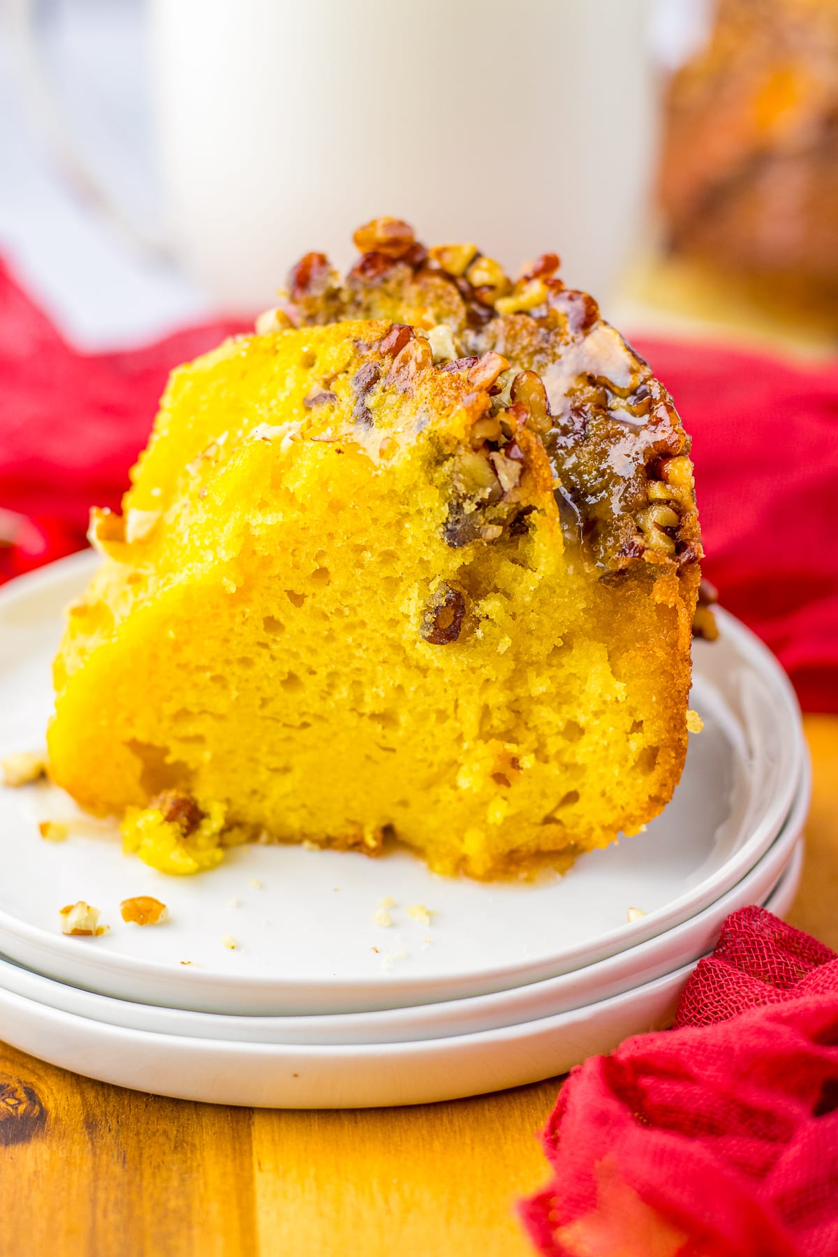 a slice of Rum Soaked Cake on a white plate