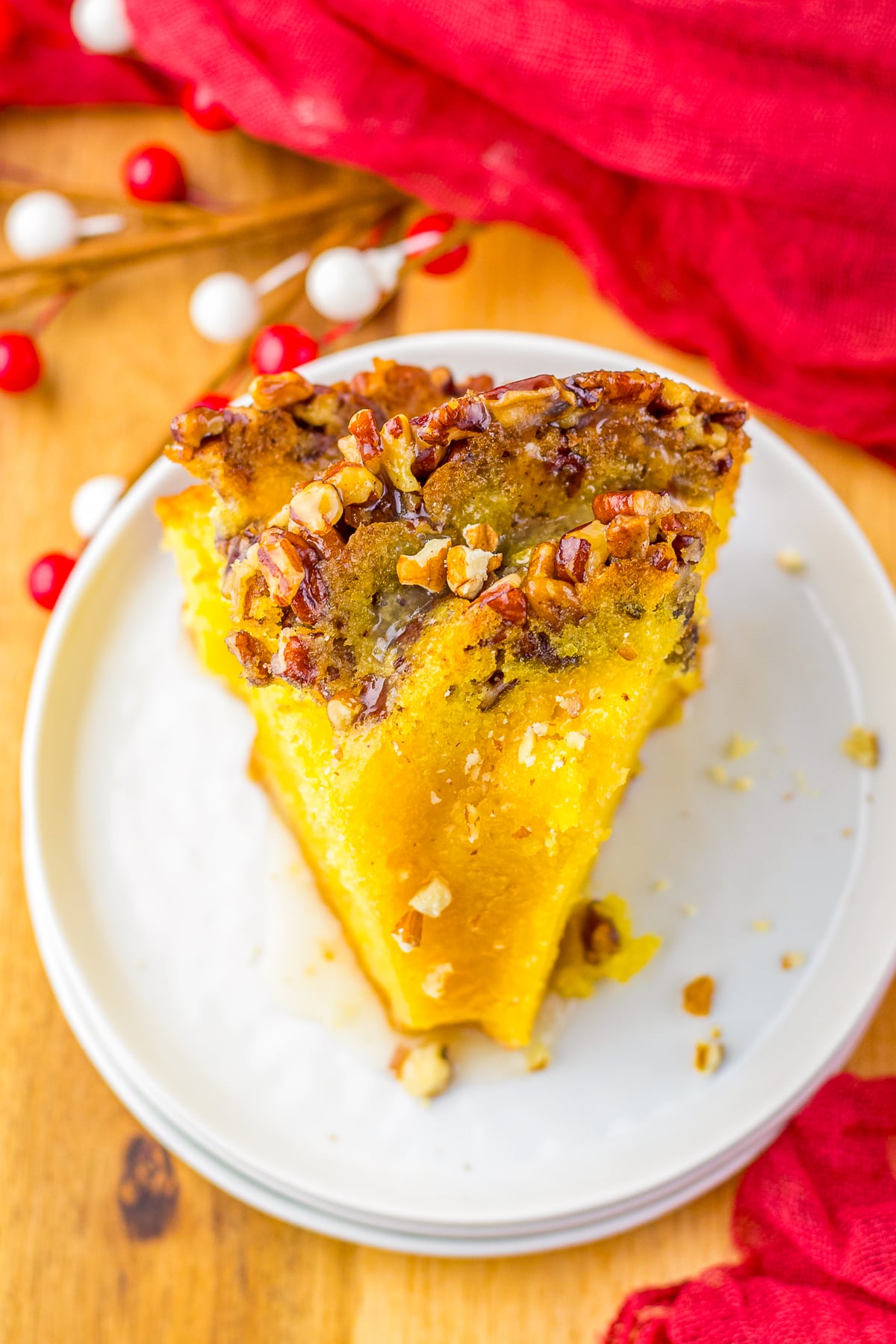 overhead image of one piece of Rum Soaked Cake on a white plate