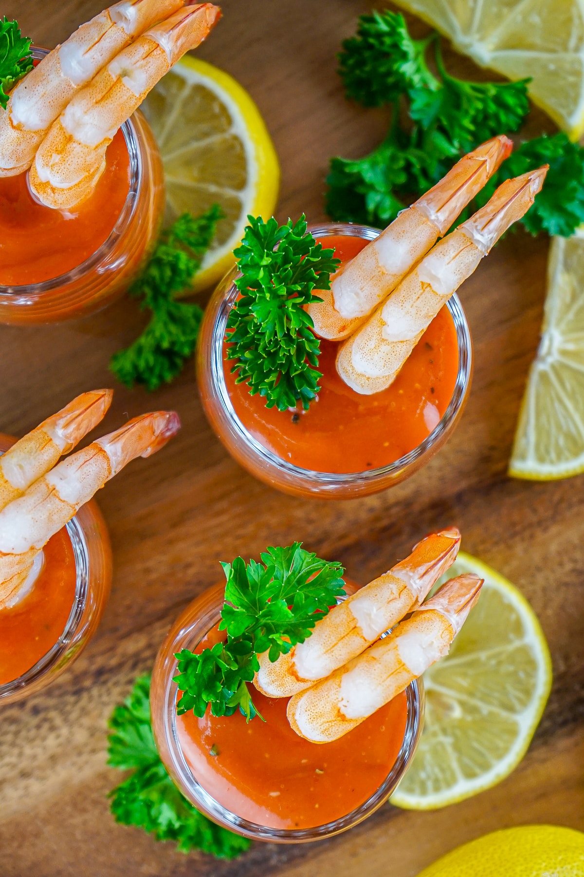 overhead image of Cocktail Shrimp on a wooden platter