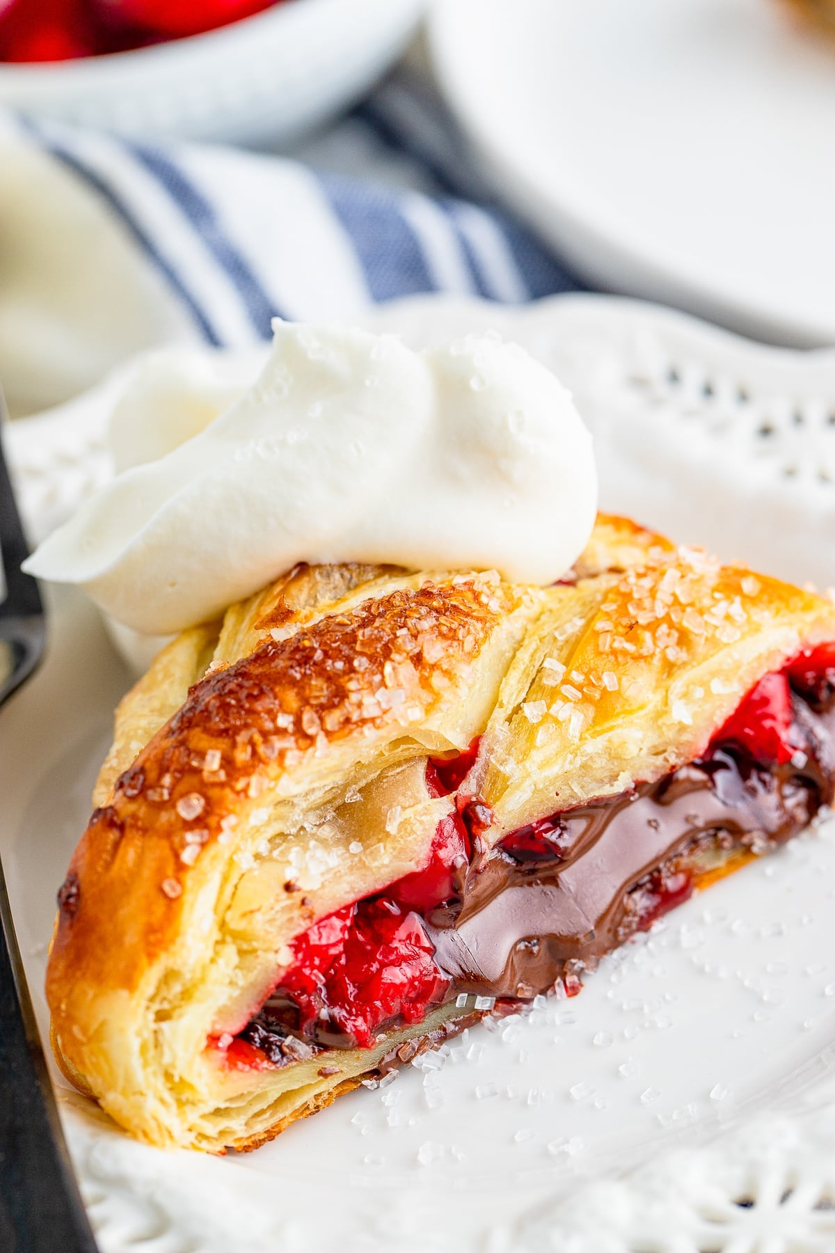 up close image of a piece of Pastry Braid on a white plate