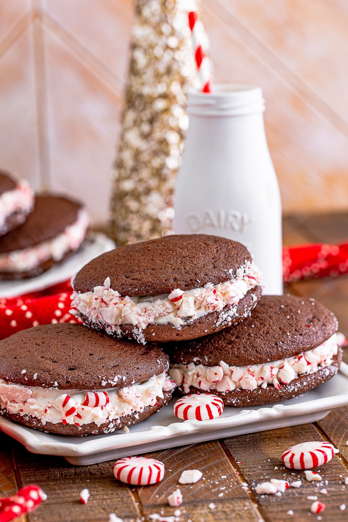 farther away image of three Whoopies Pies on a white plate