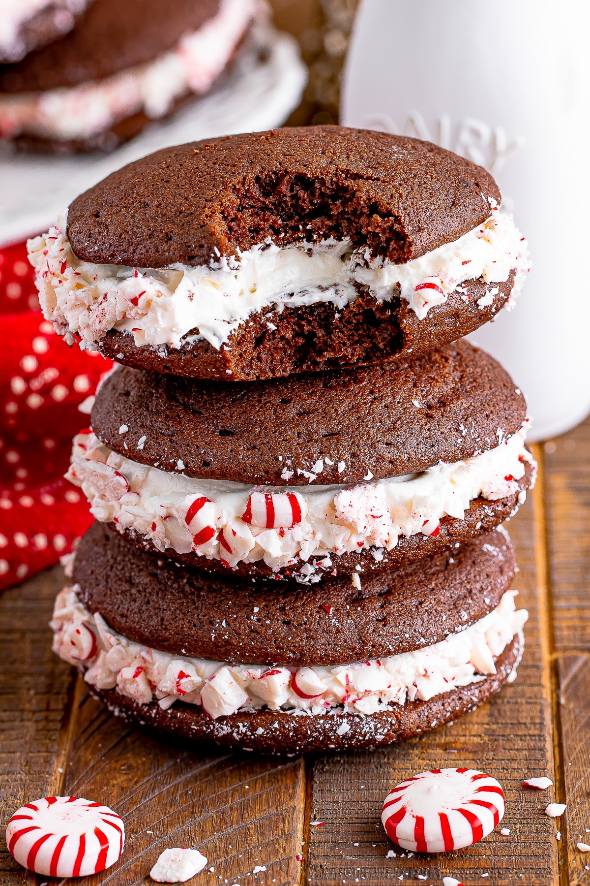 three Whoopies Pies stacked on top of each other, the one on top has a bite taken out