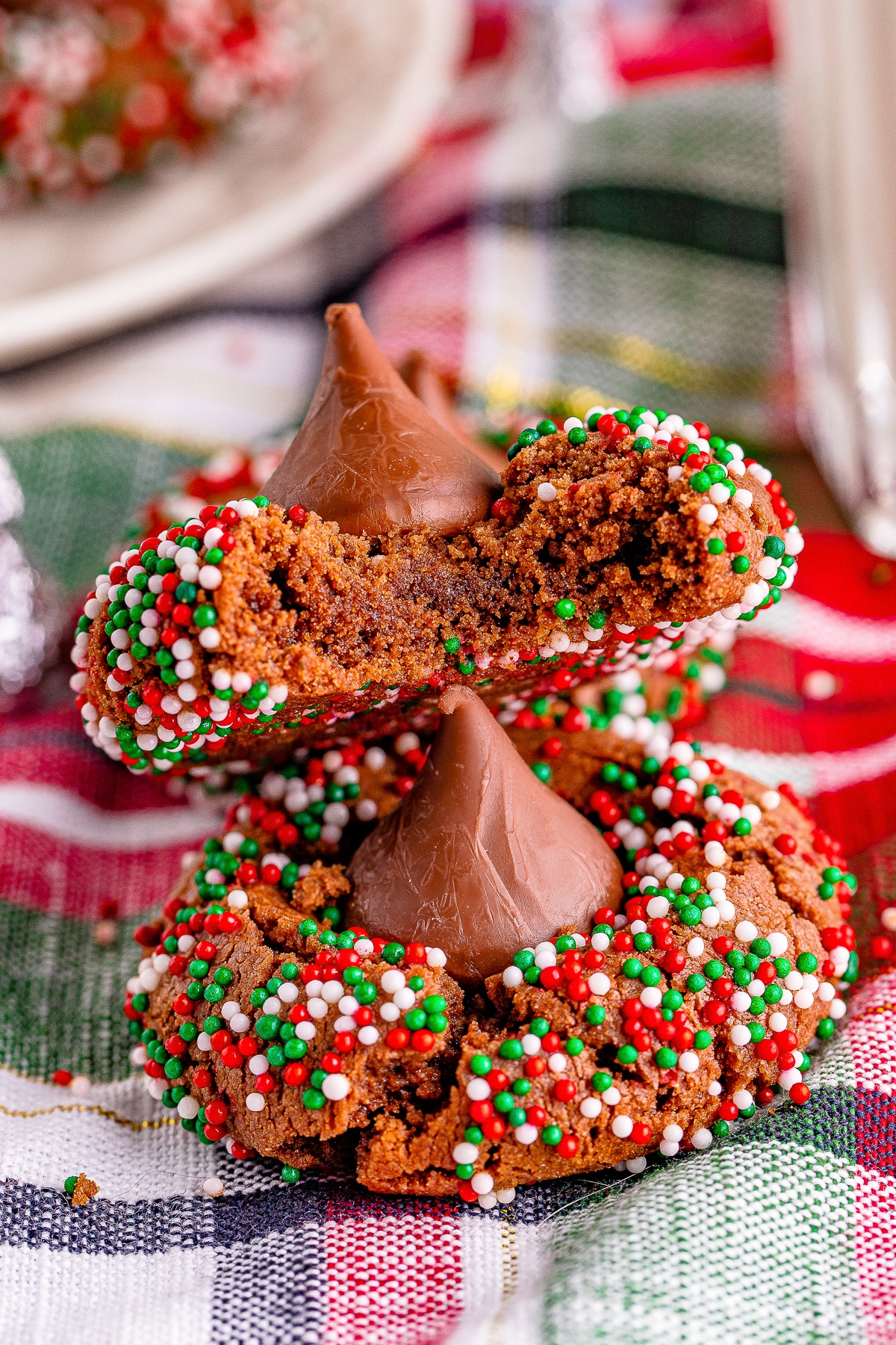 two Blossom Cookies on top of each other, one has a bite taken out