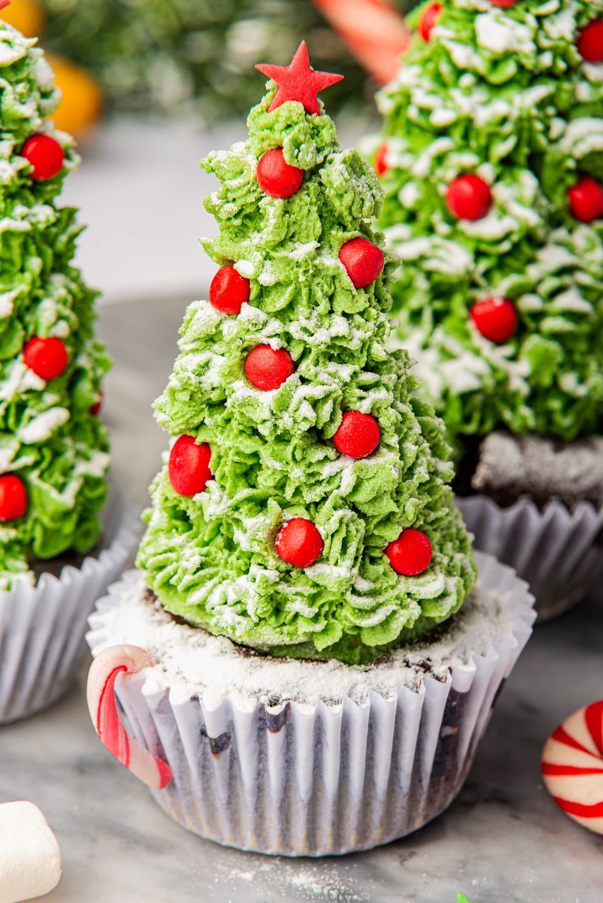 up close image of decorated Christmas cupcakes