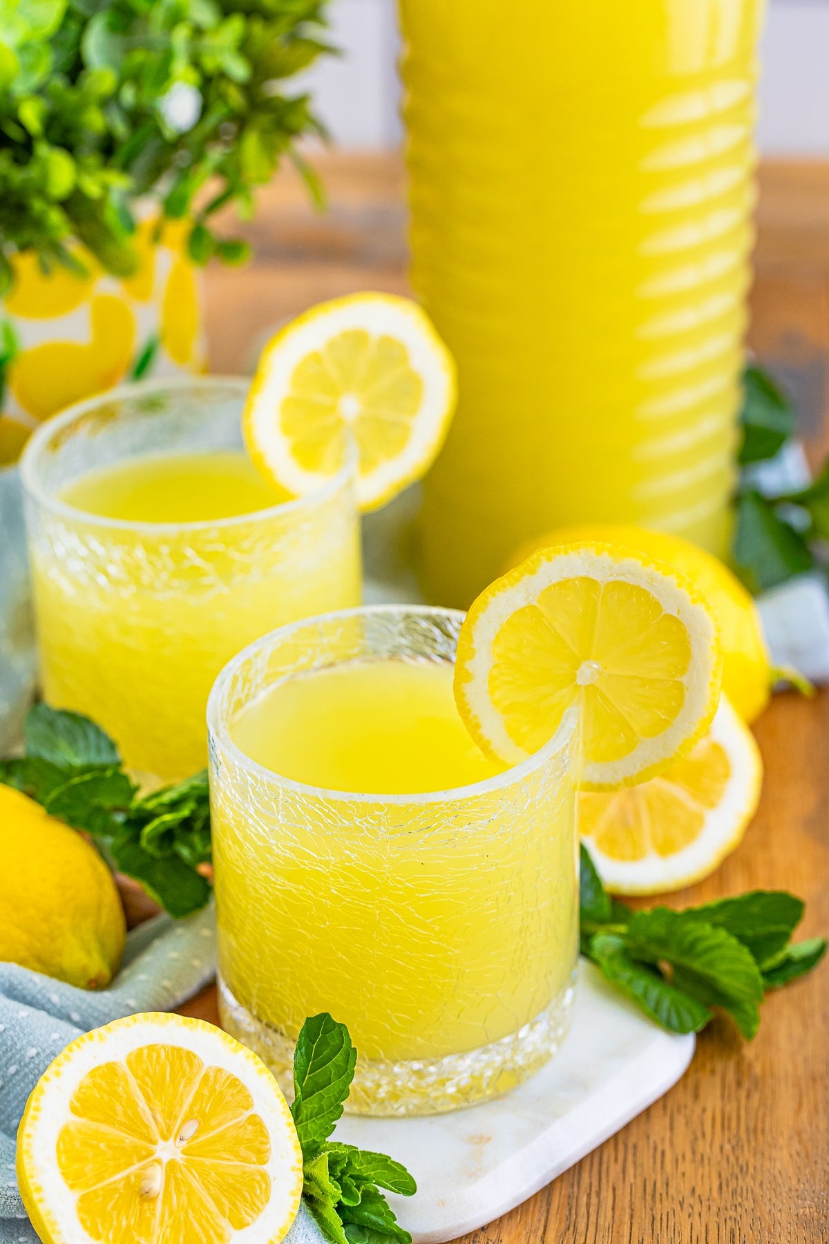 Homemade Limoncello served in glasses with garnish