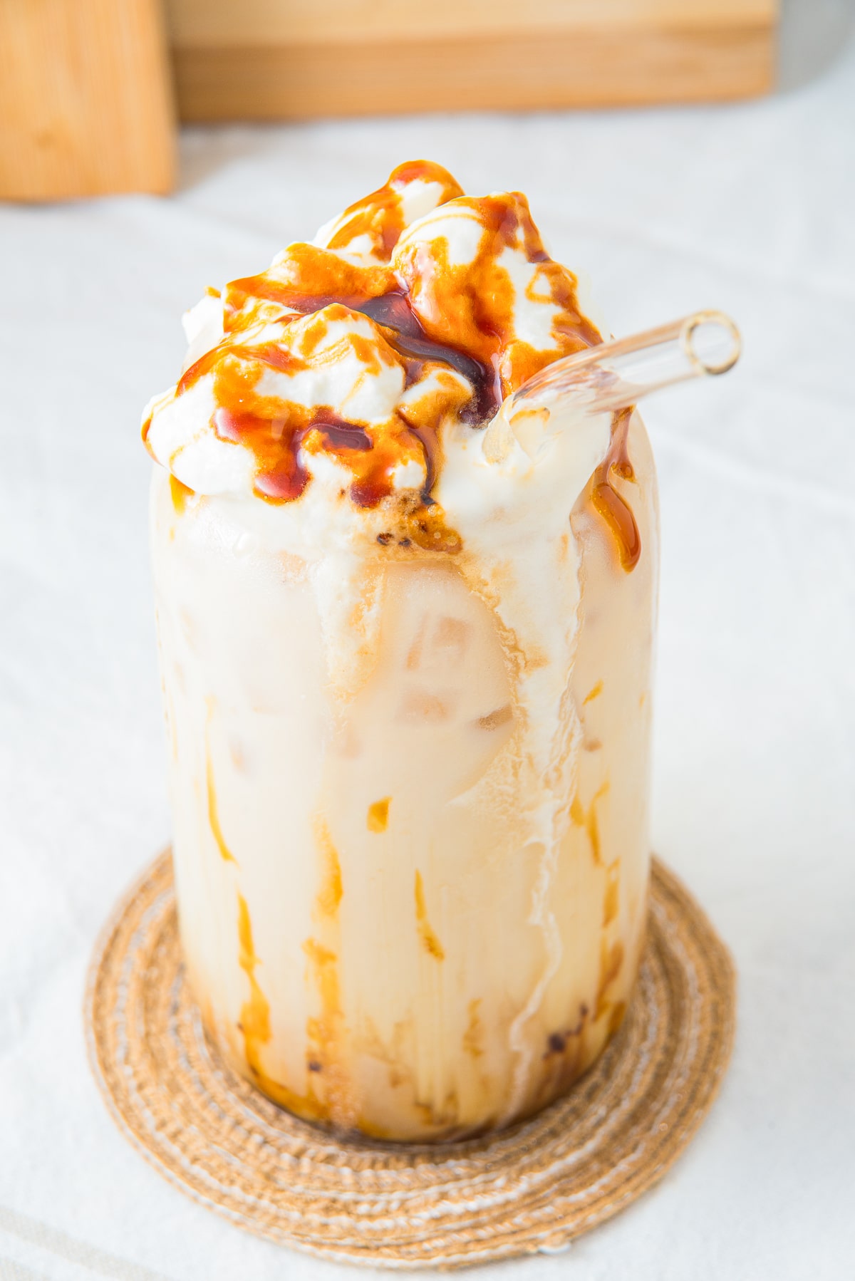 up close image of the garnish on Iced Caramel Latte