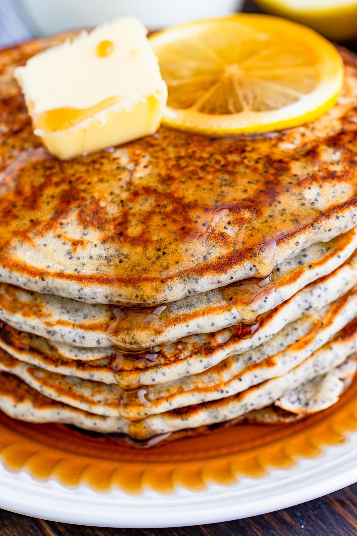 up close image Lemon poppy seed pancakes with maple syrup 
