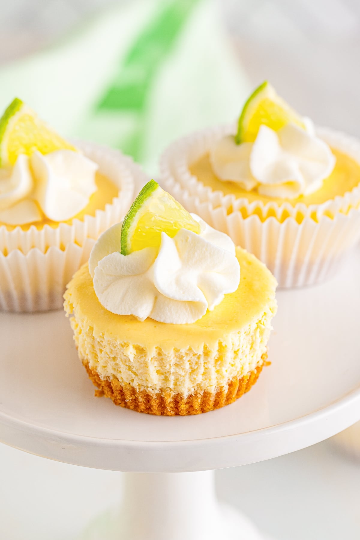 up close of Mini Cheesecakes on a cake stand