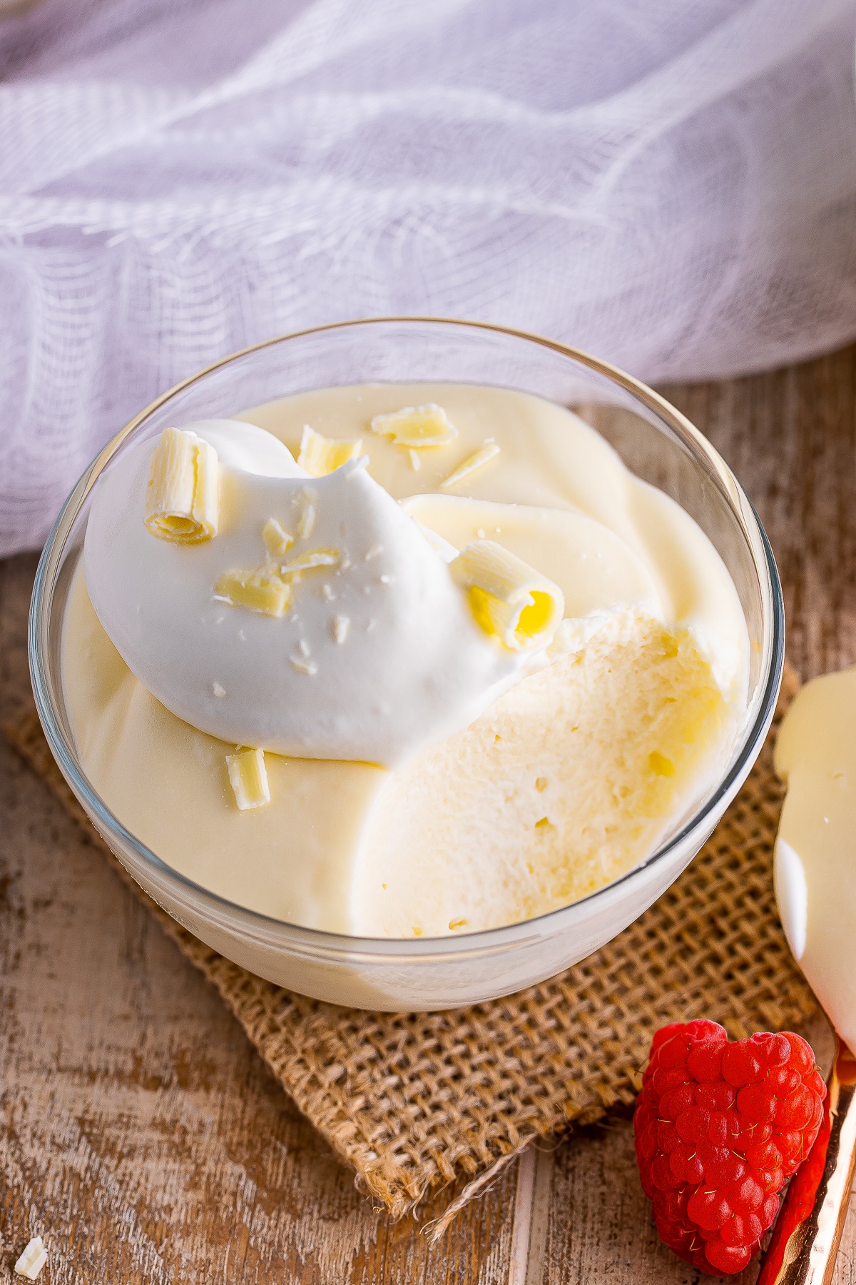 overhead image of a container of White Chocolate Mousse with a bite taken out